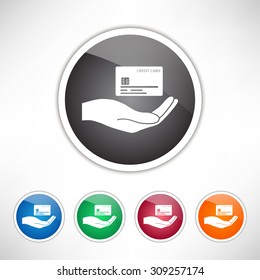 Hand holding credit card. Set of varicolored icons.