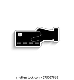 hand holding credit card  - vector icon