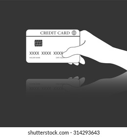 hand holding credit card vector icon with mirror reflection
