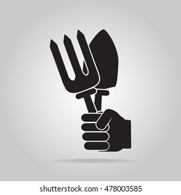 Hand holding with cultivation tool icon