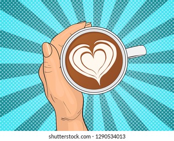 Hand holding cup of coffee. Pop Art vintage vector illustration
