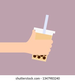 Hand holding a cup of Milk Bubble Tea. Vector icon