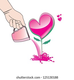 Hand holding a cup of water on the Tree of love.