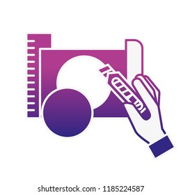 hand holding cutter making circle with paper