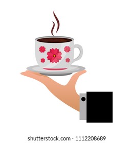 hand holding decorative flower hot coffee cup on dish