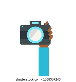 Hand holding digital camera. Illustration of hand holding camera. Vector cartoon illustration. 