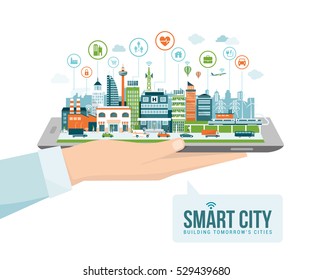 Hand holding a digital tablet with a contemporary smart city and apps icons: augmented reality and internet of things concept