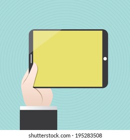 Hand holding digital tablet, device
