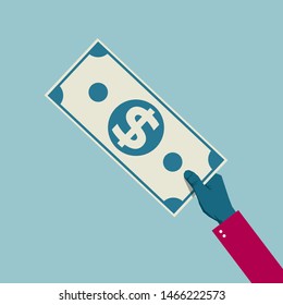 Hand holding dollar banknotes. Isolated on blue background.