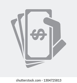 Hand holding dollars banknotes