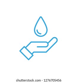 Hand holding a drop of water