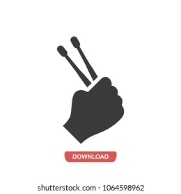 Hand holding drumsticks vector icon 