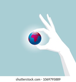 Hand holding the earth,Lifted in mid-air.