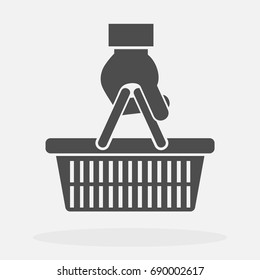 Hand holding empty shopping basket icon