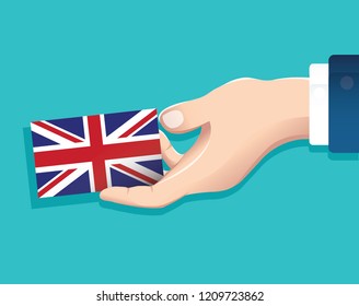 hand holding England flag card with blue background. vector illustration eps10