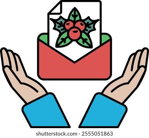 A hand holding an envelope with a red and green design on it. The design features a leafy green Christmas tree with red berries. Concept of warmth and holiday cheer