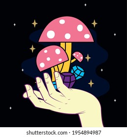 Hand holding esoteric magic mushrooms