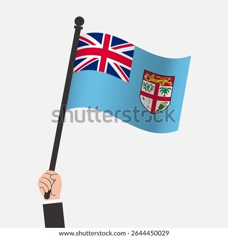 Hand Holding Fiji Waving Flag