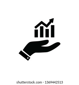 Hand holding up a financial graph