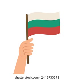 Hand holding a flag of Bulgaria. Vector illustration of the Bulgarian flag in flat style isolated on while background.