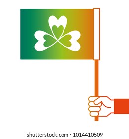 hand holding flag with clover symbol