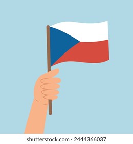 Hand holding a flag of Czech Republic. Vector illustration of the Czech flag in flat style isolated on while background.