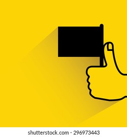 hand holding flag on yellow background, flat and shadow theme