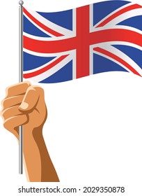 hand holding flag of United Kingdom on white background