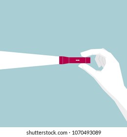 Hand holding flashlight, hand is white.