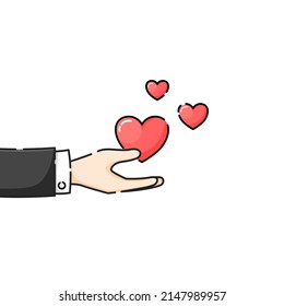 Hand holding a floating hearts