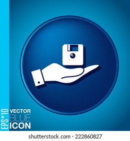hand holding a floppy, diskette. symbol store information document. computer floppy disk icon .