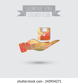 hand holding a floppy, diskette. symbol store information document. computer floppy disk icon .