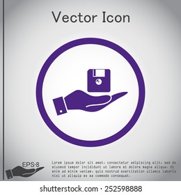 hand holding a floppy, diskette. symbol store information document. computer floppy disk icon .