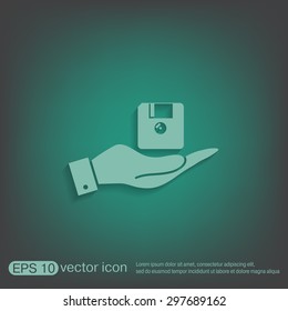 hand holding a floppy, diskette. symbol store information document. computer floppy disk icon .