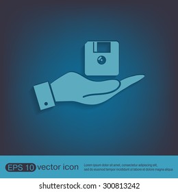 hand holding a floppy, diskette. symbol store information document. computer floppy disk icon .