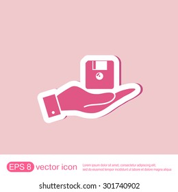 hand holding a floppy, diskette. symbol store information document. computer floppy disk icon .