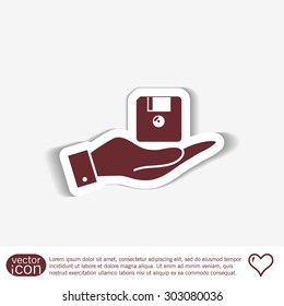 hand holding a floppy, diskette. symbol store information document. computer floppy disk icon .