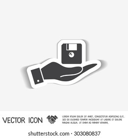 hand holding a floppy, diskette. symbol store information document. computer floppy disk icon .