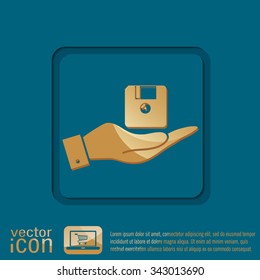 hand holding a floppy, diskette. symbol store information document. computer floppy disk icon .
