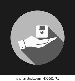 hand holding a floppy, diskette. symbol store information document. computer floppy disk icon .