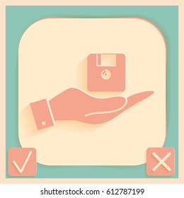 hand holding a floppy, diskette. symbol store information document. computer floppy disk icon .