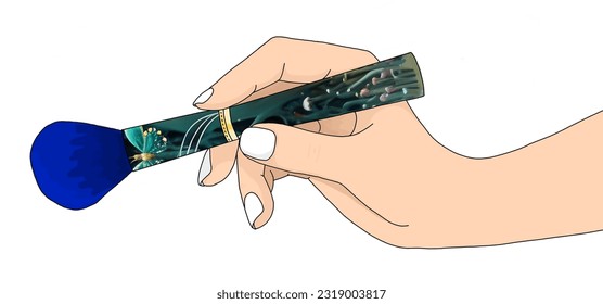 Hand holding floral pattern makeup brush