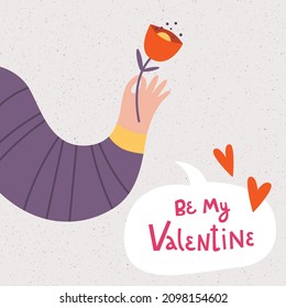 A hand holding a flower. Saint Valentine's day card. Speech bubble with love words. Cute postcard design. Vector illustration. 