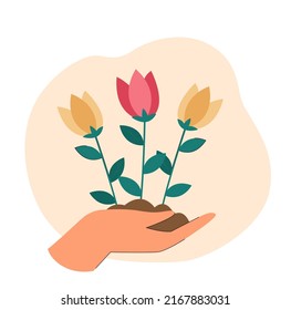 Hand holding flowers. Palm with soil and tulips. Nature, ecology, care concept for website or landing page concept for website or landing page