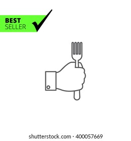 Hand holding fork 