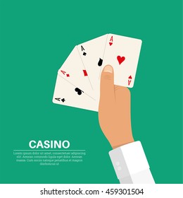 Hand holding four playing cards, aces of all colors. Symbolizes a combination of "caret" in poker. The concept of good luck, a prize, wealth in games of a casino. Vector illustration in flat style.