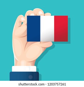 hand holding France flag card with blue background. vector illustration eps10