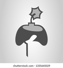 Hand holding game controller with an ignited fuse. Hardcore gaming concept