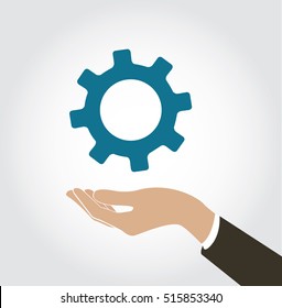 hand holding gear icon vector