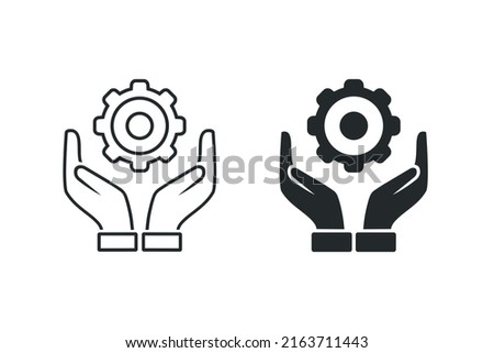 Hand holding gear icon. Vector illustration